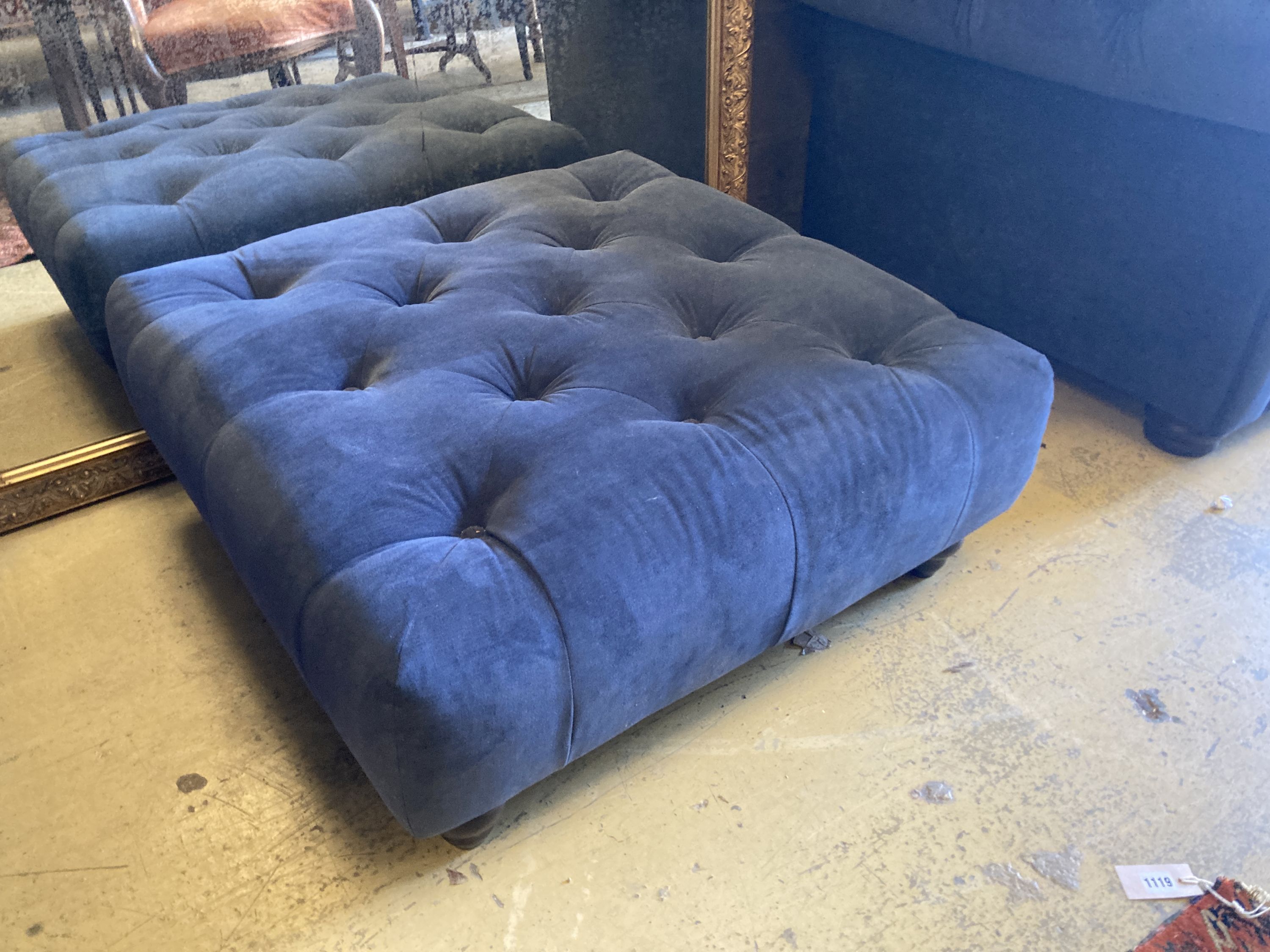 A pair of Chesterfield style settees upholstered in blue dralon and a footstool, largest length 210cm, depth 96cm, height 74cm